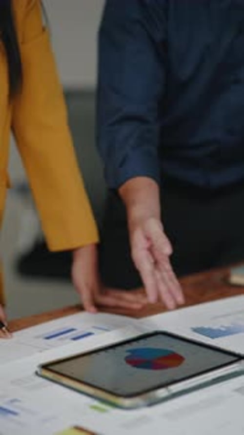 Vertical footage of Close up of hand teamwork business group are meeting working and brainstorming