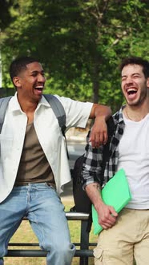 Two Students Chatting on College Campus