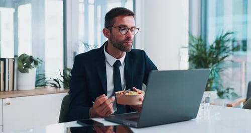 Eating, laptop and businessman in office with breakfast for health, wellness or diet snack
