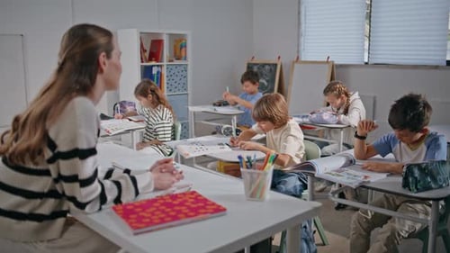 Teacher Asking Questions Lesson Closeup Group Pupils Learning School Classroom