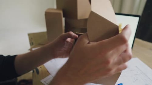 The Designer Works Comes Up with the Packaging Design