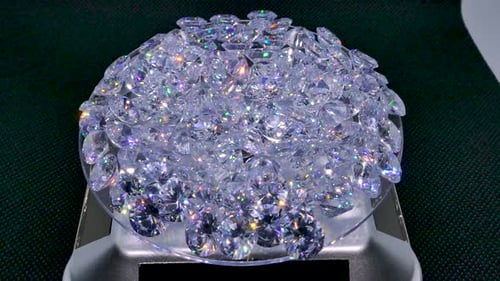 Sparkling Diamonds on Scale Reflecting Rainbow Light