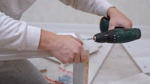 Assembling Wooden Furniture at Home with Power Drill