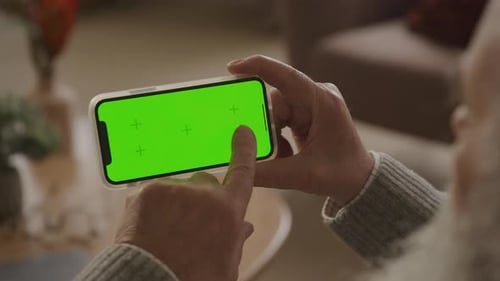 Pressione uma vez no lado direito do smartphone com tela verde