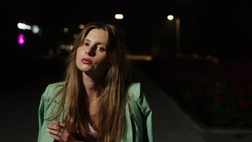 Attractive Woman Posing at Night on City Street