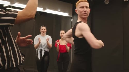 Men Dancing Salsa at Group Class