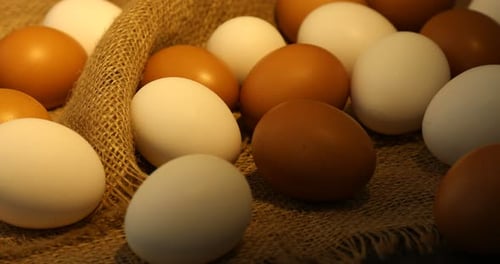 Fresh Chicken Eggs On Rustic Burlap Background