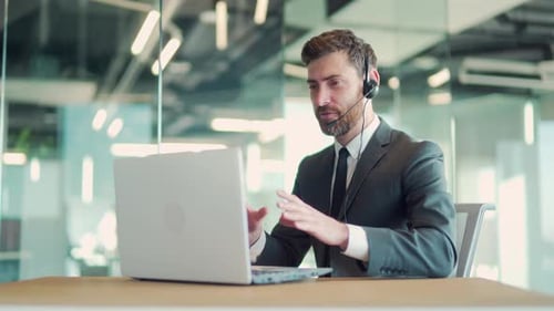 Business Man Using Laptop For Online Conference