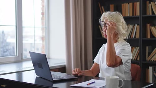 Adult Types on Laptop, Stretches Back