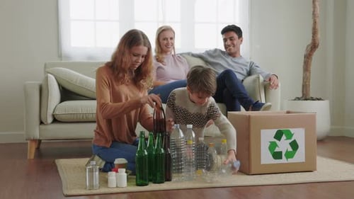 Family Sorting Glass and Plastic Recycling at Home