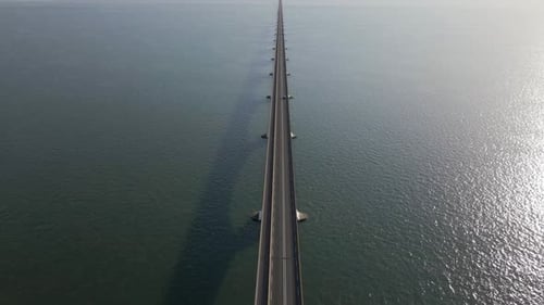 beautiful aerial images of the enormously long Zeeland bridge and the traffic over the highway on th