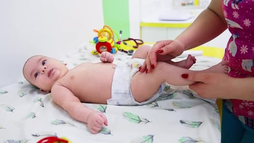 Infant on Examination Table in Doctor's Office