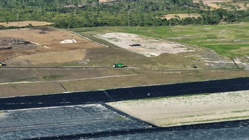 Aerial View of Trucks at Landfill