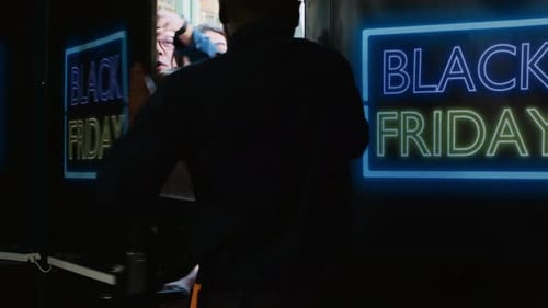 People Crowd Door on Black Friday