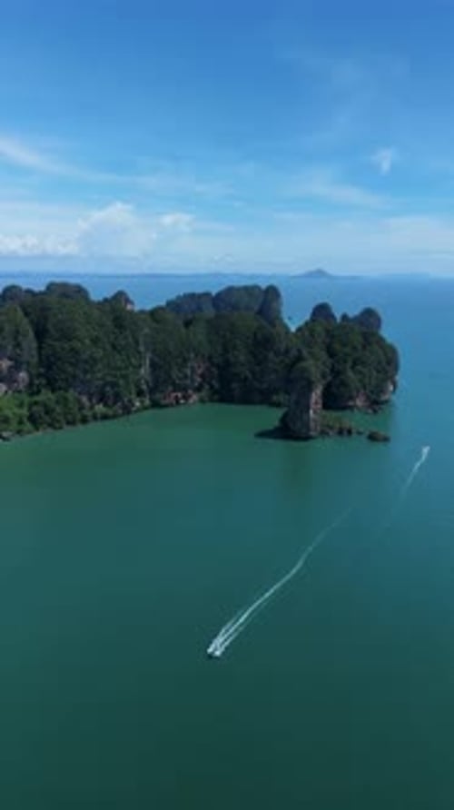 Vertical aerial ascend reveal over Railay Beach and Phra Nang Beach, Krabi