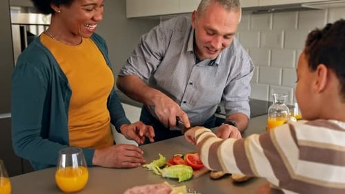 Family Cooking Together in Kitchen