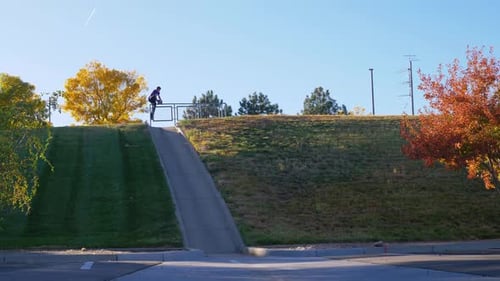 Skater bombs a massive hill