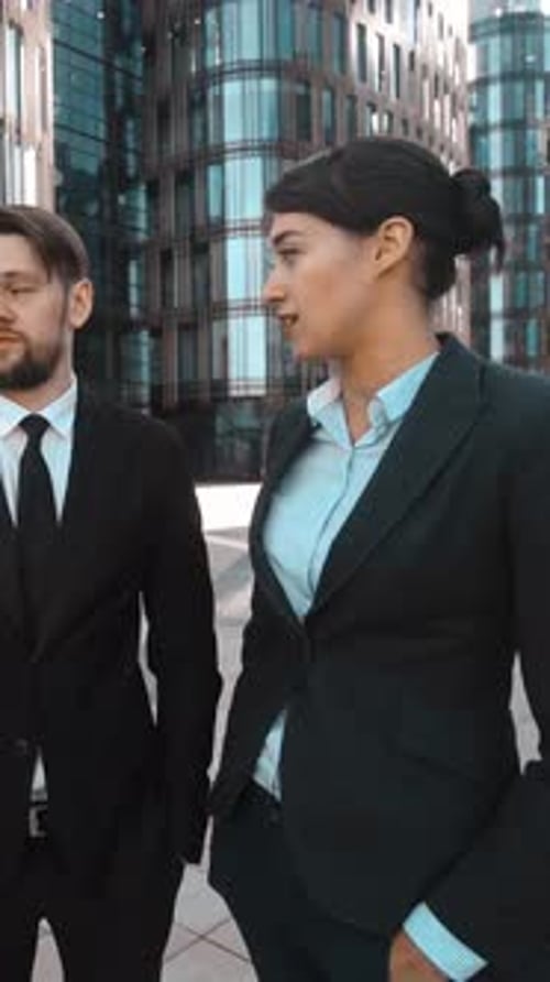 Vertical of Business People Glad to See You Handshake Hello