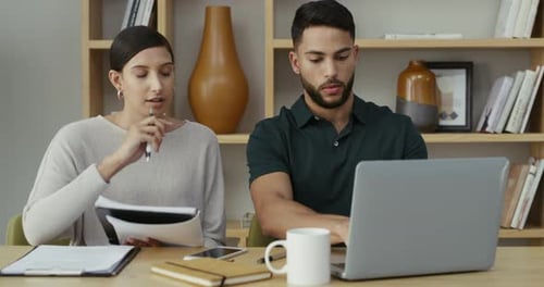 4k video footage of two businesspeople having a meeting in an office at work