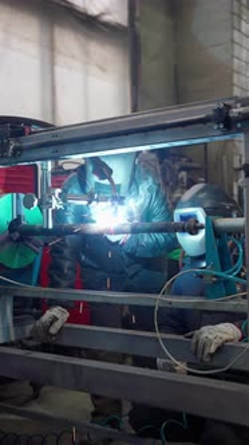 Welder Connects Metal Parts with Welding Machine Welding Machine Concept