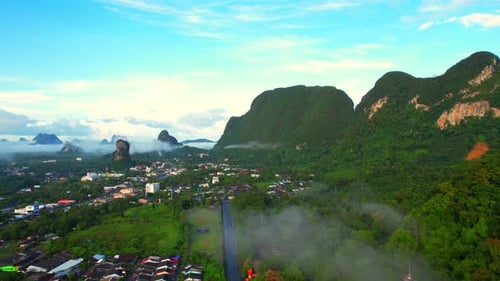 Drone flying over Phang Nga city in the tropical forest