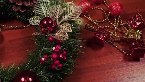 Festive Christmas Wreath and Holiday Decorations on Table