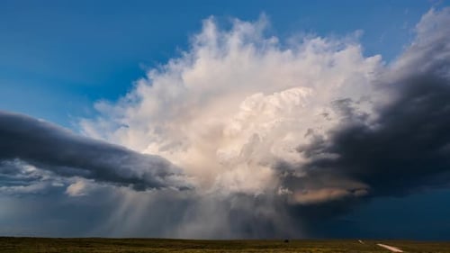 Ominous Storm Clouds and Prairie Landscape