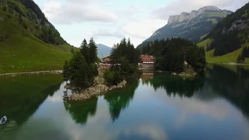Alpine Lake with Mountains and Island Retreat
