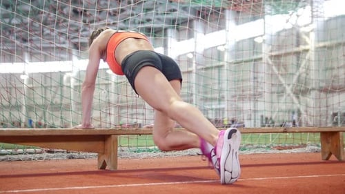 Athletic Woman Doing Incline Mountain Climbers Exercise
