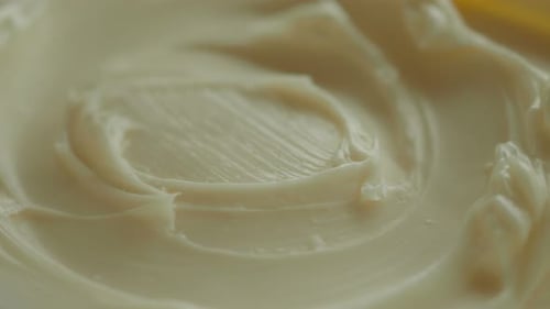 Close Up of Fresh Butter in a Container