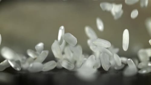 Rice Falls on the Table Filmed on a Highspeed Camera at 1000 Fps
