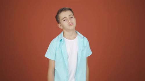 The boy who sighs and puffs out of boredom.