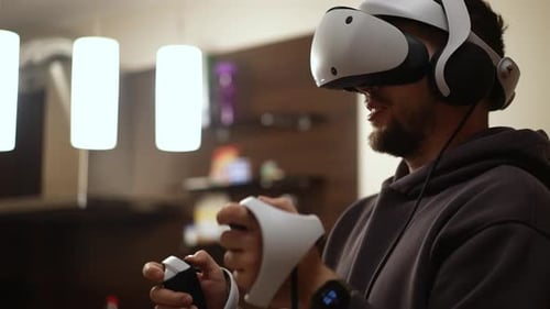 Man Immersed in Virtual Reality at Home