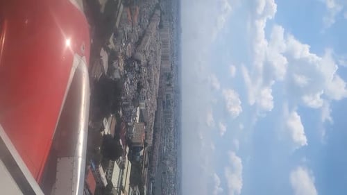Landing in ho chi minh city, view from airplane window, vertical