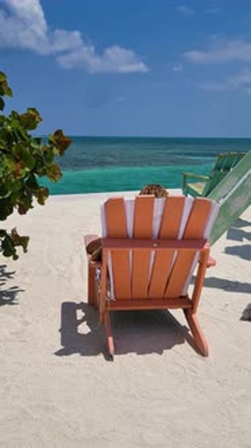 Vertical View of Beach Chair in Caye Caulker, Tourist Destination in Belize on Caribbean Sea