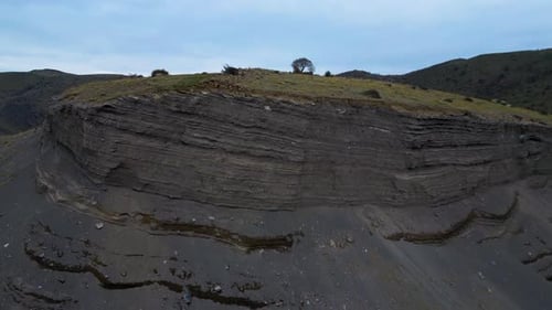 Aerial View of Layered Rock Formation and Cliff Landscape in Nature