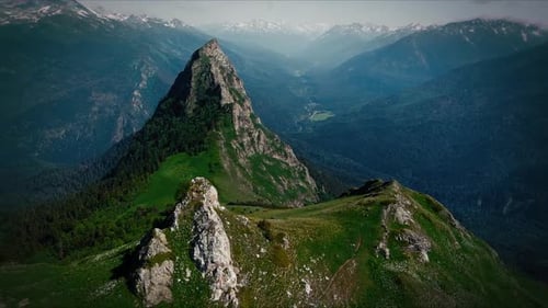 Beautiful rocky mountain landscape on a sunny day. Breathtaking aerial view on a valley with mountai