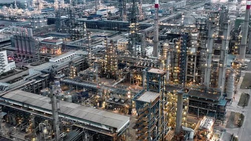 Aerial view of chimneys of power plant, an industrial district. Modern large thermal power plant