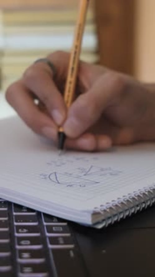 Studying on a Notebook Sheet