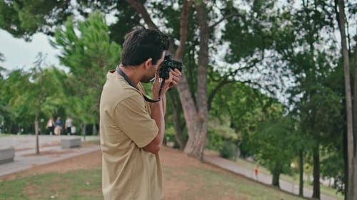 Professional Man Photographing Green Park at Weekend Walk Close Up Guy Looking