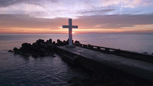 A Flight Around a Christian Holy Cross Early in the Morning at Sunrise The Large Cross Stands on the