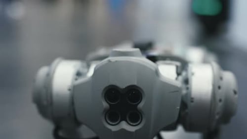 Close View of the Robot Assistant Standing and Looking at the Camera AI Machine Playing with Camera