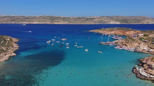 Aerial Panorama of Blue Lagoon Comino Malta with Boats and Coves