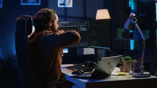 Timelapse of Self Employed Computer Scientist Typing Complex Code in Home Office