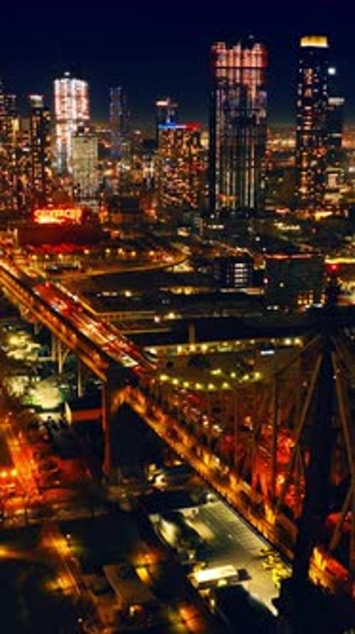 Night New York city aerial view. American commercial buildings avenue. Vertical video