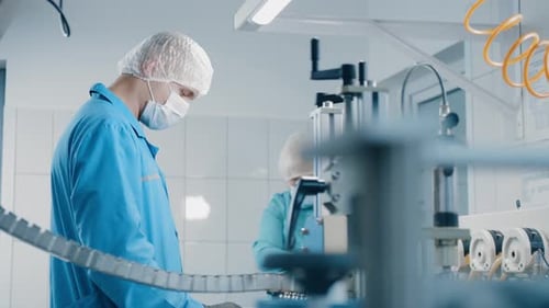Worker Works On a Machine
