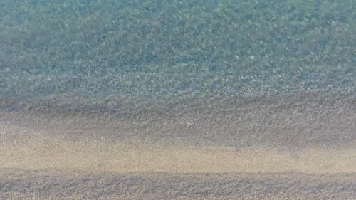 Overhead Drone View of the Shoreline Gentle Caress