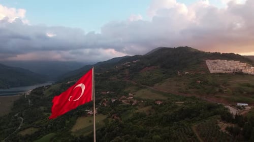 Turkish Flag Waving in the Wind at Sunset