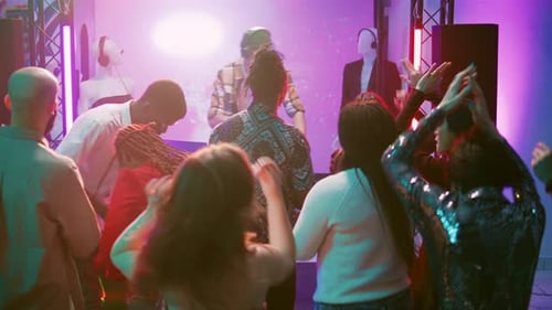 Diverse People Partying with DJ on Stage