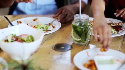 Friends Enjoying a Meal Together at Home